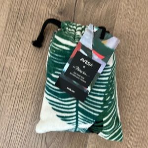 Aveda Limited edition hair towel, hundred hundred percent organic cotton.